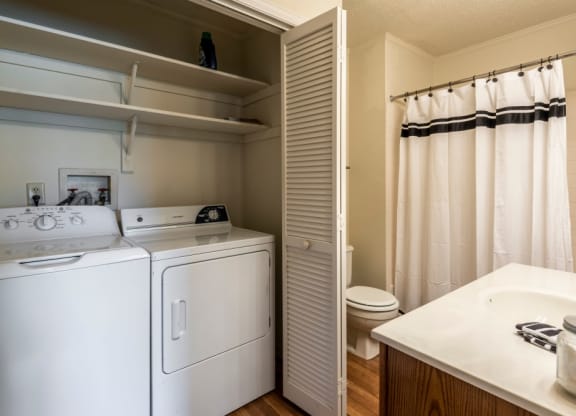 Washer, Dryer, & Bathroom at Coach House Apartments, Kansas City, MO