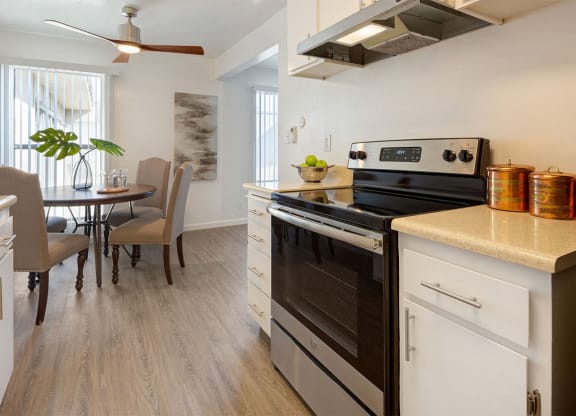 Fitted Kitchen With Island Dining at Three Crown Apartments, Alameda, California