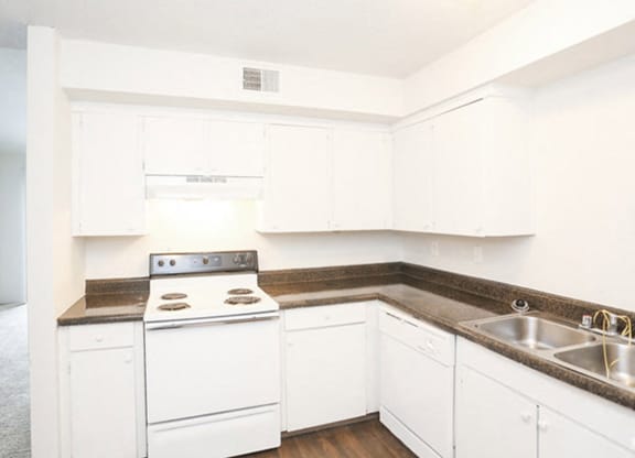 Wood floor kitchen at Canyon Creek Apartments, Missouri, 64132