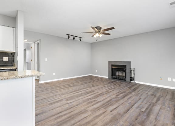 Living room with fireplace at Eddingham in Lawrence, KS