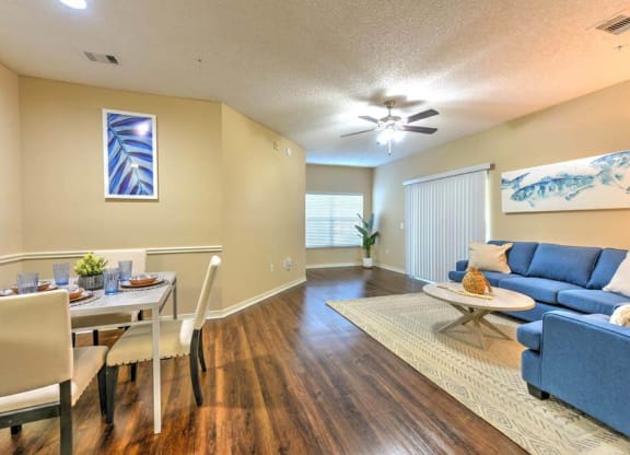 a living room with a couch and a table  at Ocean Park, Jacksonville Beach, FL, 32250