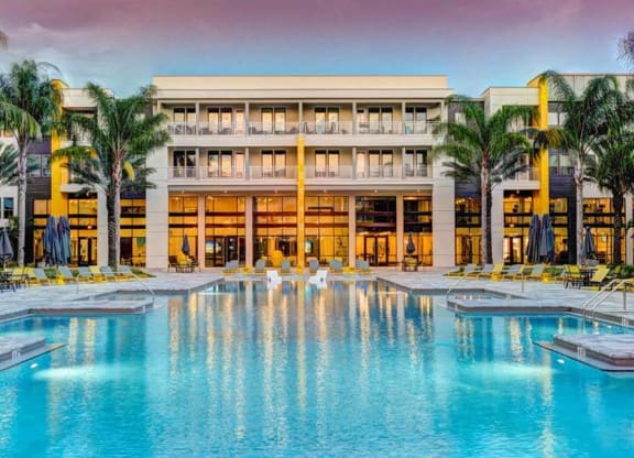 a large swimming pool with a large building in the background  at Fusion, Jacksonville, Florida