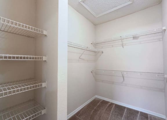 a walk in closet in a bedroom  at Ocean Park, Florida, 32250