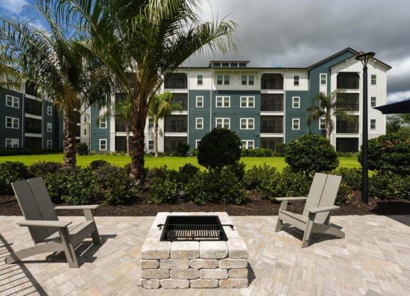 Fire Pit with Two Chairs in Front at Fountainhead, Jacksonville, FL, 32258