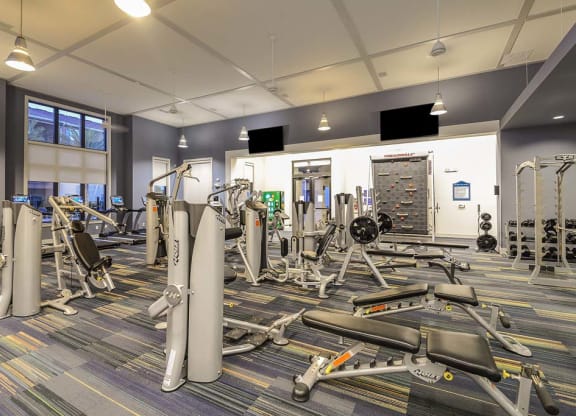 a room filled with lots of different types of exercise equipment  at Cabana Club - Galleria Club, Jacksonville, FL, 32256