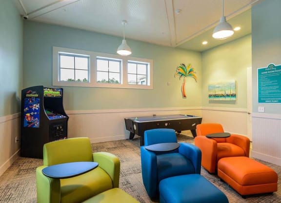 a game room with a foosball table and a pool table  at Palm Bay Club, Jacksonville, FL