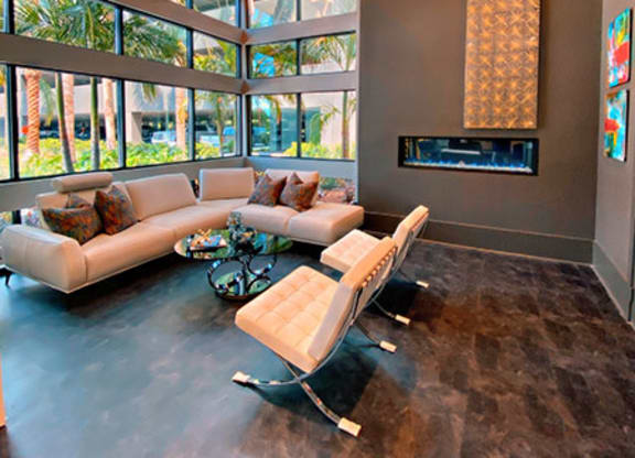 a living room filled with furniture and a large window  at Fusion, Jacksonville, 32256