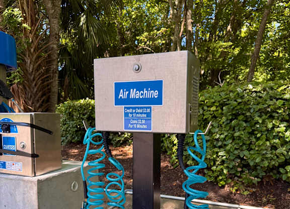 An air machine is located in a concrete box.