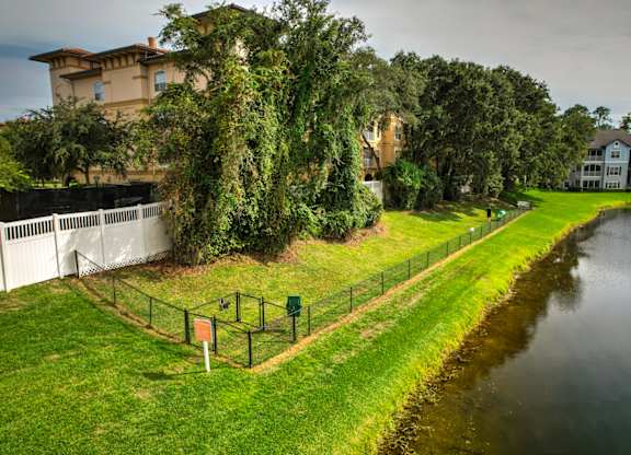 A park with a pond and a playground at Ocean Park, Florida