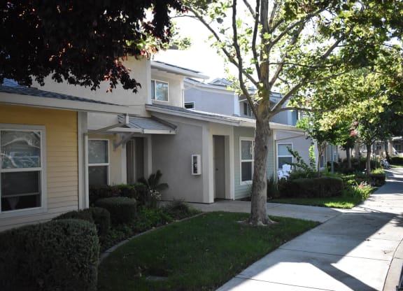 Moore Village Mutual Housing Community exterior building photo - units
