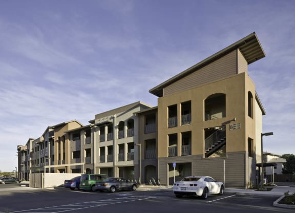 New Harmony Mutual Housing Community building exterior, parking lot