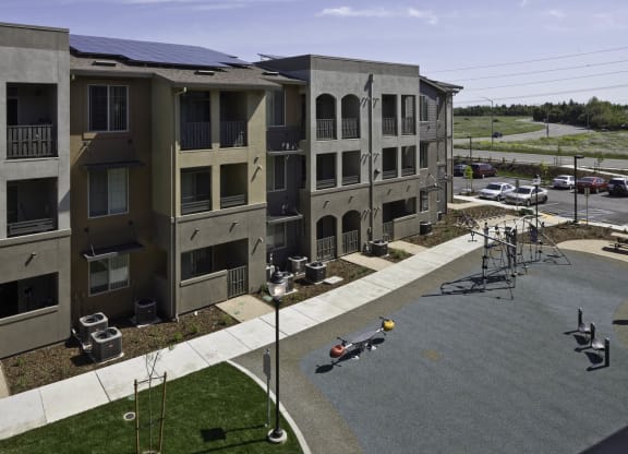 New Harmony Mutual Housing Community buildings and playground photographed from above