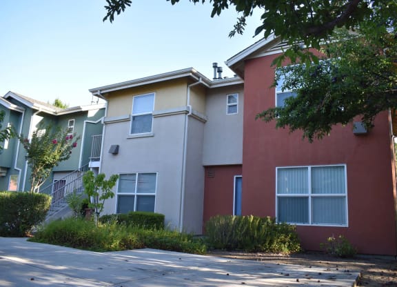 Tremont Green Mutual Housing Community unit exterior, sidewalks