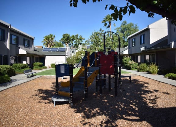 Twin Pines Mutual Housing Community courtyard and units, playground