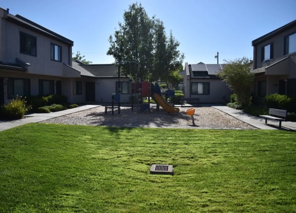 Twin Pines Mutual Housing Community courtyard and units, playground