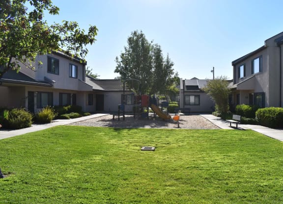 Twin Pines Mutual Housing Community courtyard and units, playground