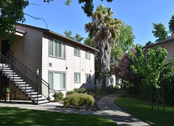 Mutual Housing at Foothill Farms unit exterior and landscaped sidewalk