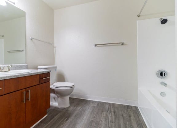 a bathroom with a toilet and a sink