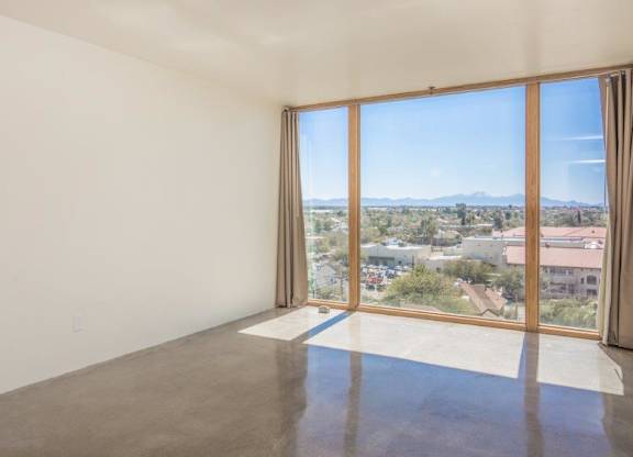 A room with a large window at Herbert Residential, Tucson, AZ