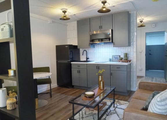 a view of a kitchen from the living room