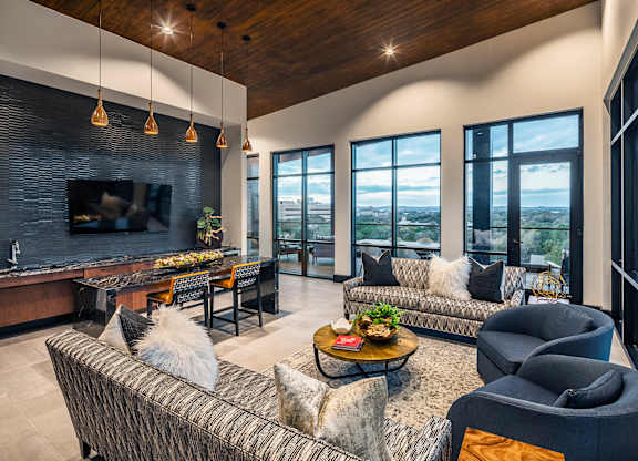Aura Thirty2 Apartments Clubhouse Lounge with Seating