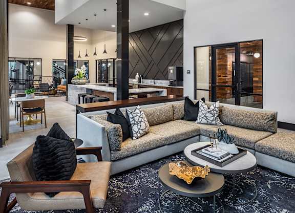 Aura Thirty2 Apartments Clubhouse with Seating