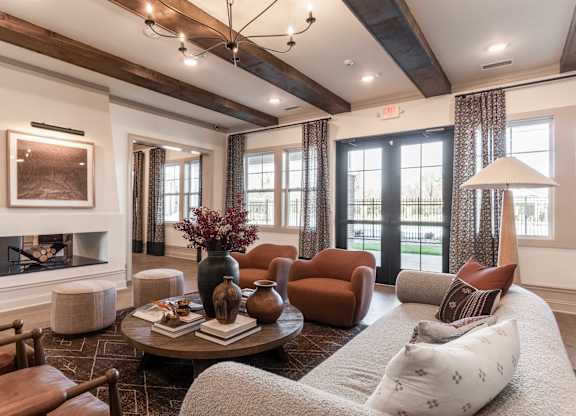 A living room with a fireplace and a couch.