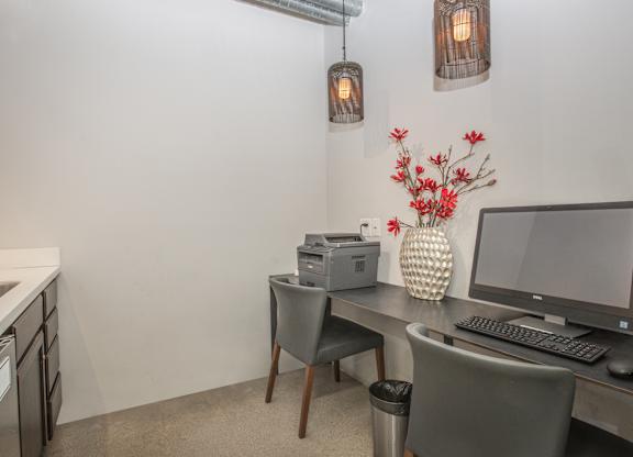 A small office with a desk, chairs, and a computer at Herbert Residential, Arizona