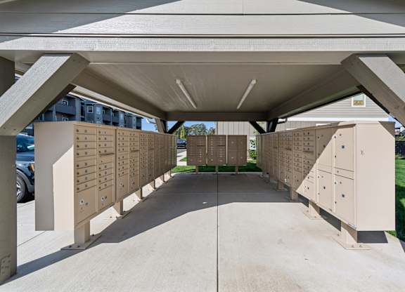 A concrete structure with a series of drawers on the sides.