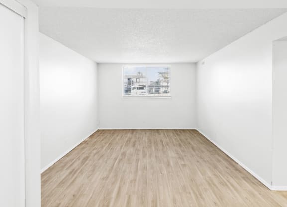 Proximity Apartment Homes Bedroom with Wood like floors