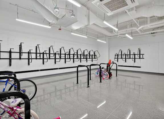 A bike is parked in a bike rack.