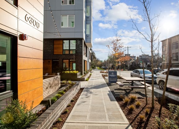 sidewalk outside corner 63 apartments