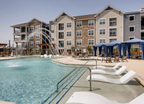 The Ranch at First Creek Apartments Swimming Pool with Sprinklers