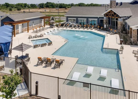 The Ranch at First Creek Apartments Swimming Pool Area with Lounging Area