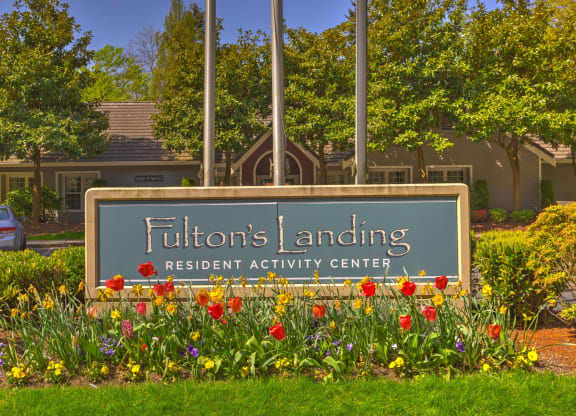 the sign at Fulton's Crossing and Landing Apartments