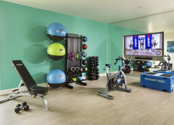 a room filled with furniture and a flat screen tv
