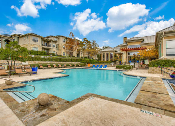 Hudson Miramont Apartments Pool with Lounge Chairs
