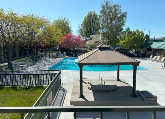 9 North Apartments pool with lounge chairs