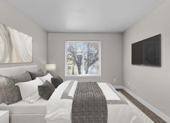 an image of a bedroom with a bed and a window