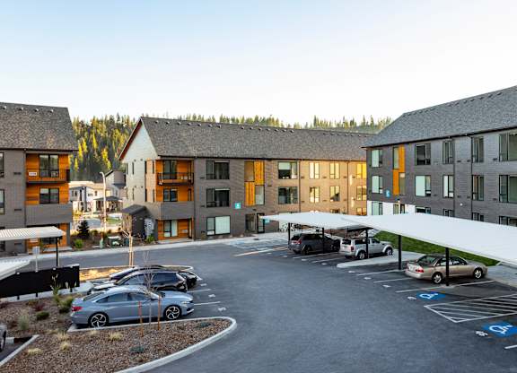 Bo Apartments parking lot with covered area