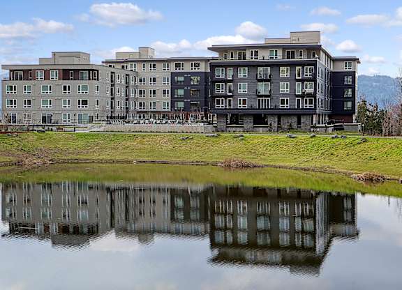 a building reflected in a body of water
