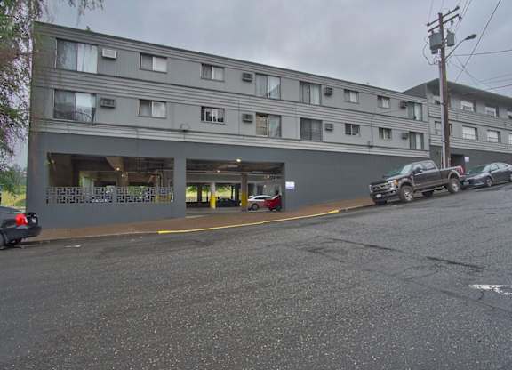 The Hudson Apartments Vancouver, WA building exterior with parking garage
