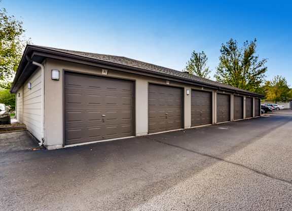 A row of garage doors are closed.