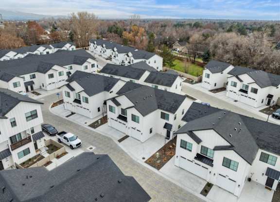 A bird's eye view of a residential area with multiple houses.