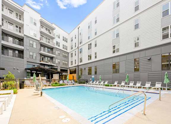 Alton Mill District Apartments in Charlotte, North Carolina Pool with Lounge Chairs