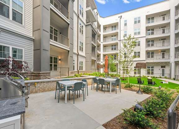 Alton Mill District Apartments in Charlotte, North Carolina Patio with Seating and BBQ Grills