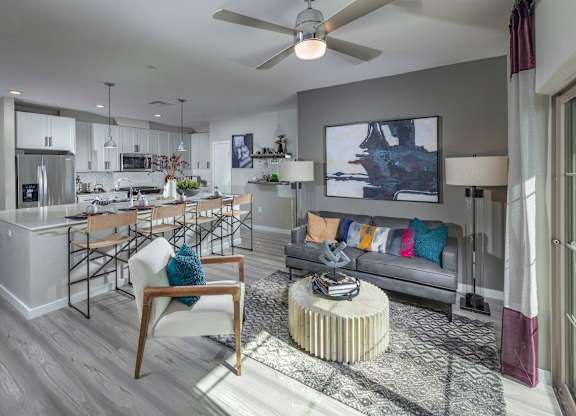 Alton Southern Highlands Apartments in Las Vegas, Nevada Model Living Room and Kitchen with Large Island