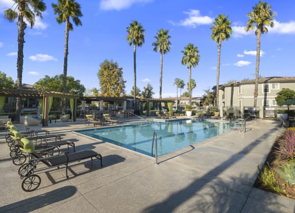 Estancia at Mission Grove Apartments Pool with Lounge Seating