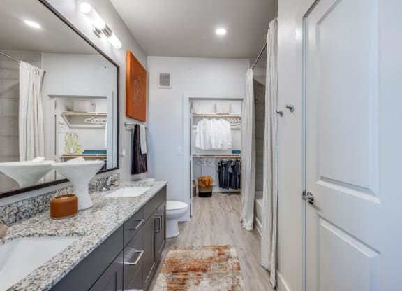 Aura Beacon Island Model Bathroom with Walk-In Closet