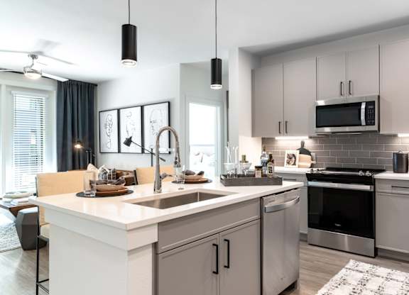 Aura Main Street Apartments in Lewisville, Texas Model Kitchen